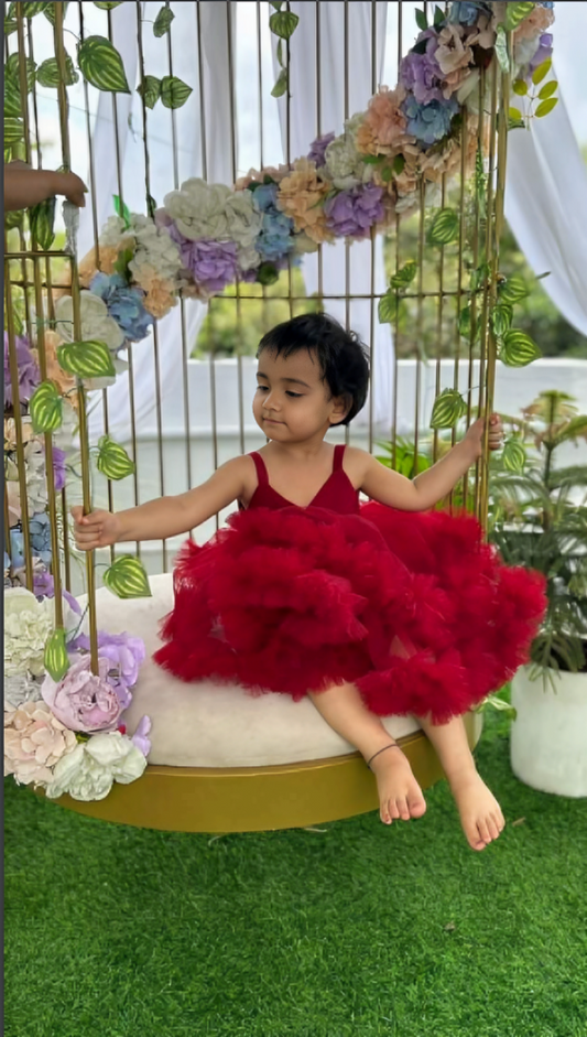 RED CRISS CROSS DRAPED BODY WITH ASSYMETRICAL RUFFLE SKIRT