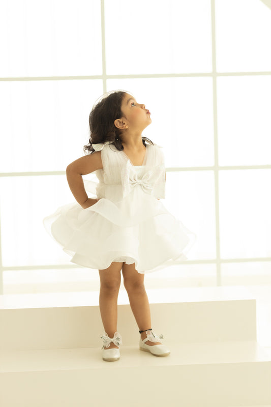 KNEE LENGTH TAILBONE DRESS WITH DRAPPED BOSSOM AND A BIG BOW