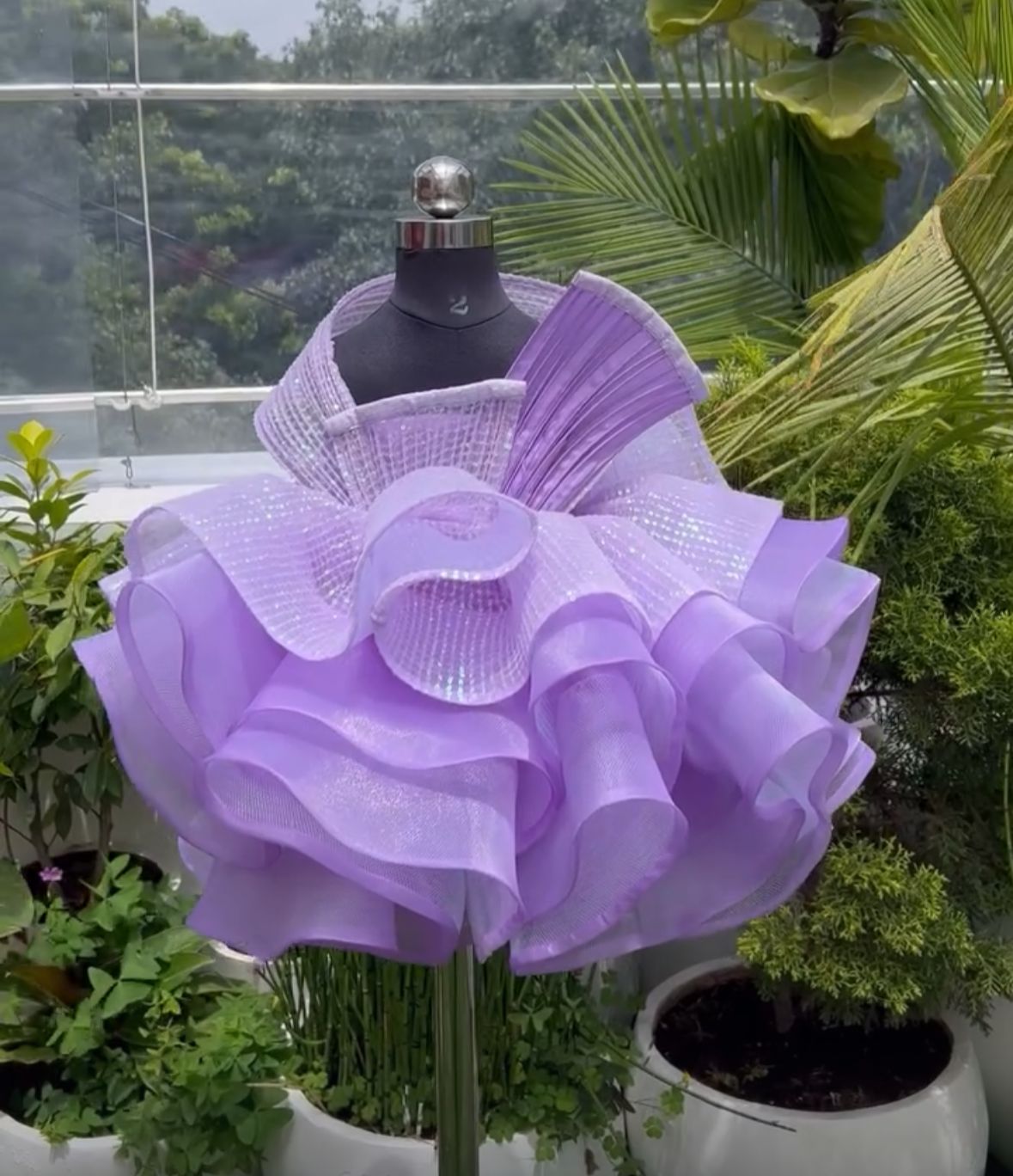 AN ORGANZA SEQUINS PEPLUM SKIRT WITH RING TOP