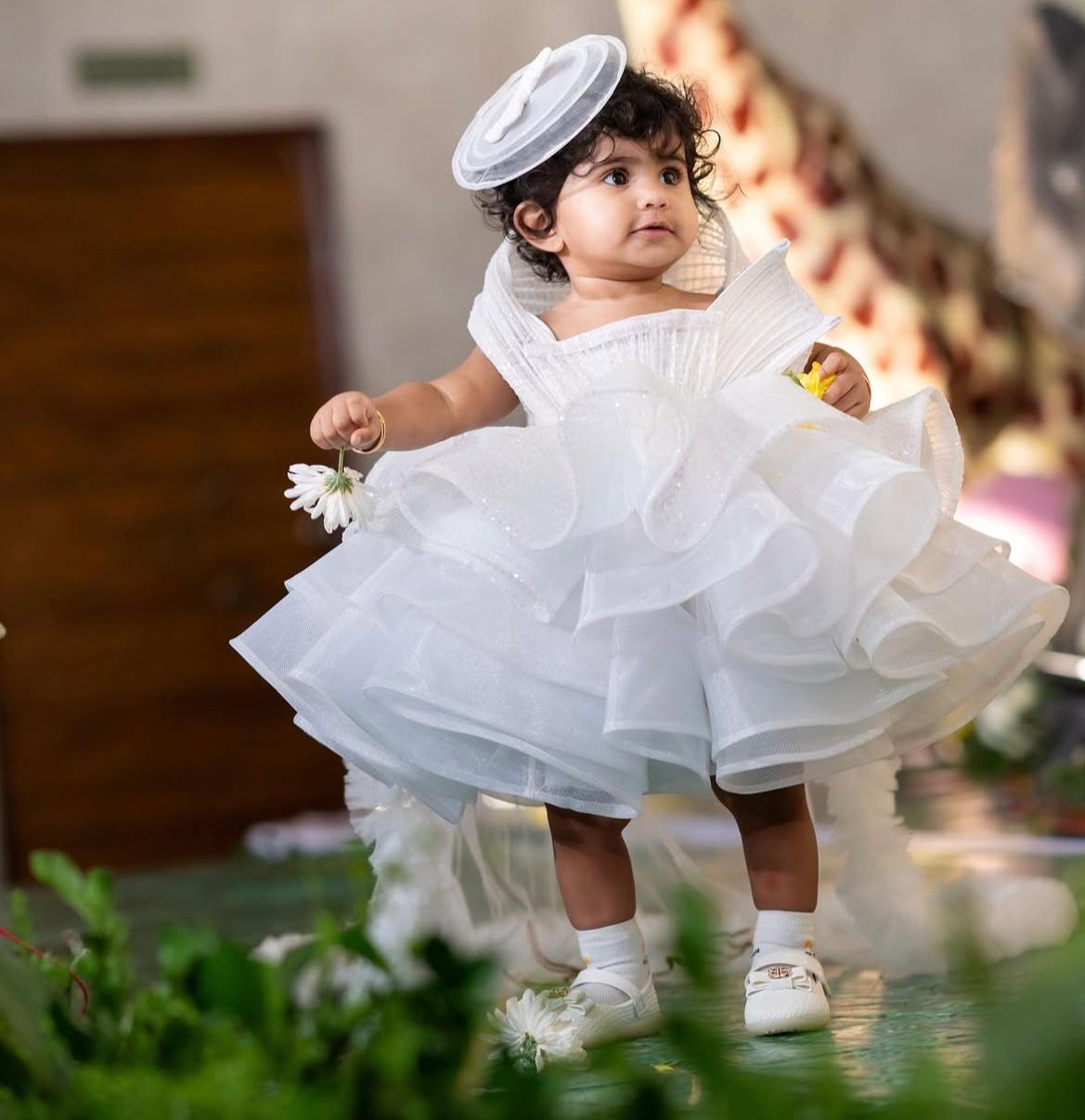 AN ORGANZA SEQUINS PEPLUM SKIRT WITH RING TOP