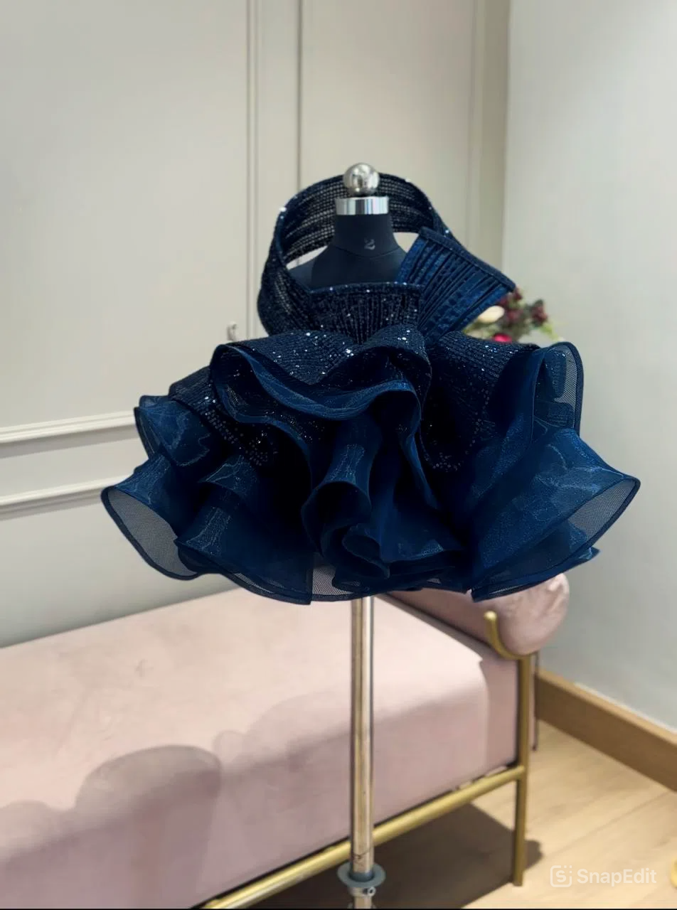 AN ORGANZA SEQUINS PEPLUM SKIRT WITH RING TOP