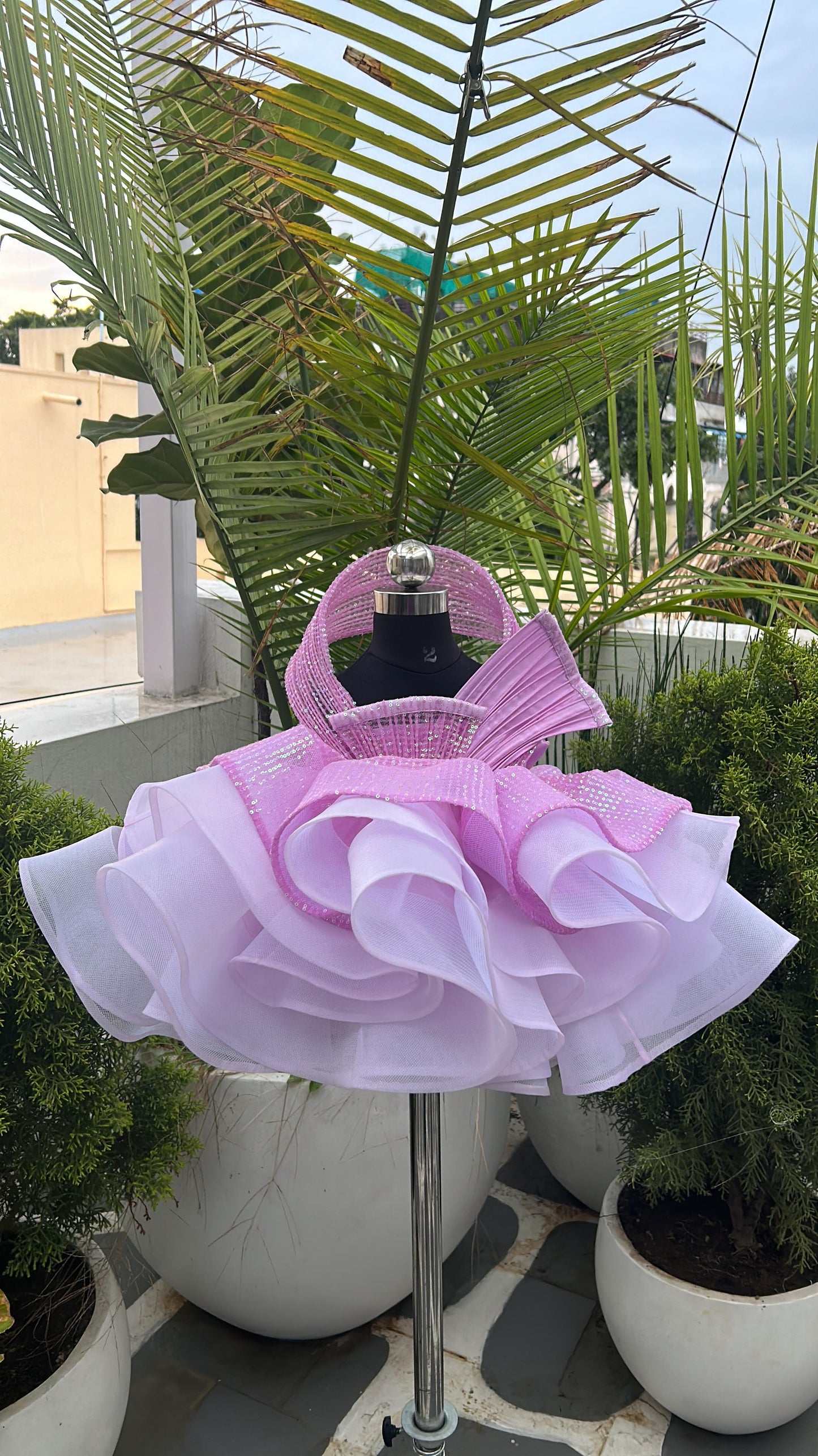 AN ORGANZA SEQUINS PEPLUM SKIRT WITH RING TOP