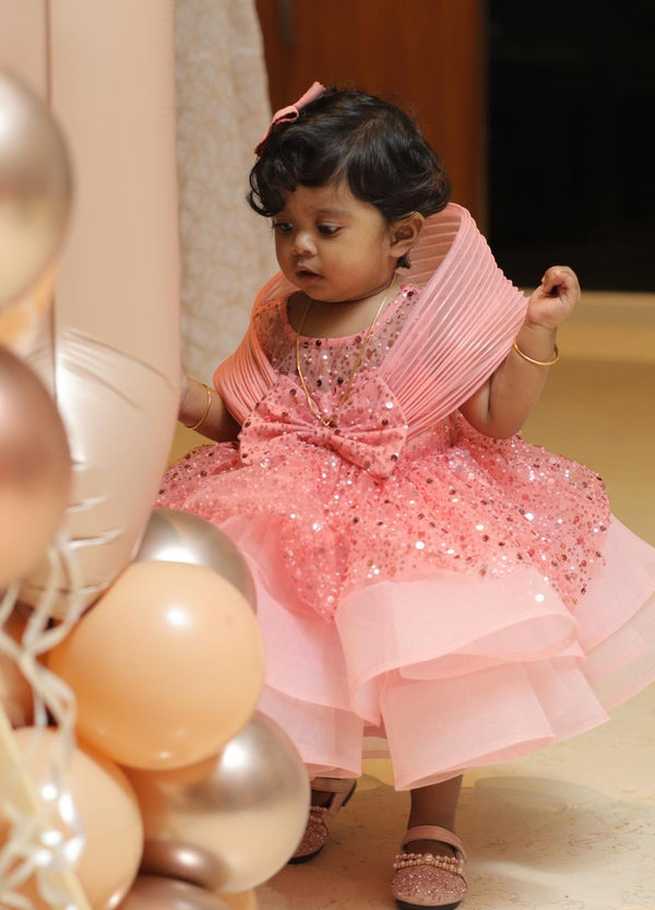 PEPLUM PIECE WITH SEQUINS AND PEARLS AND A NET RING