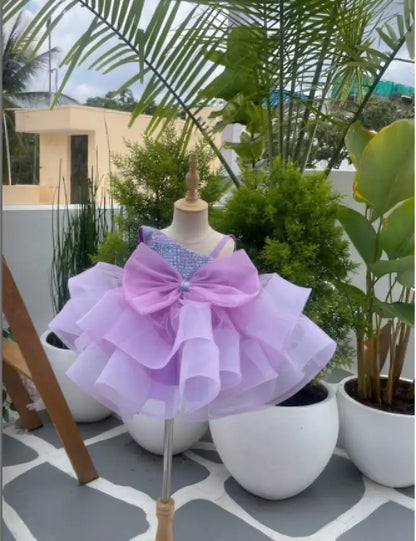 PURPLE ONE SHOULDER PIECE WITH TAILBONE SKIRT AND BIG BOW