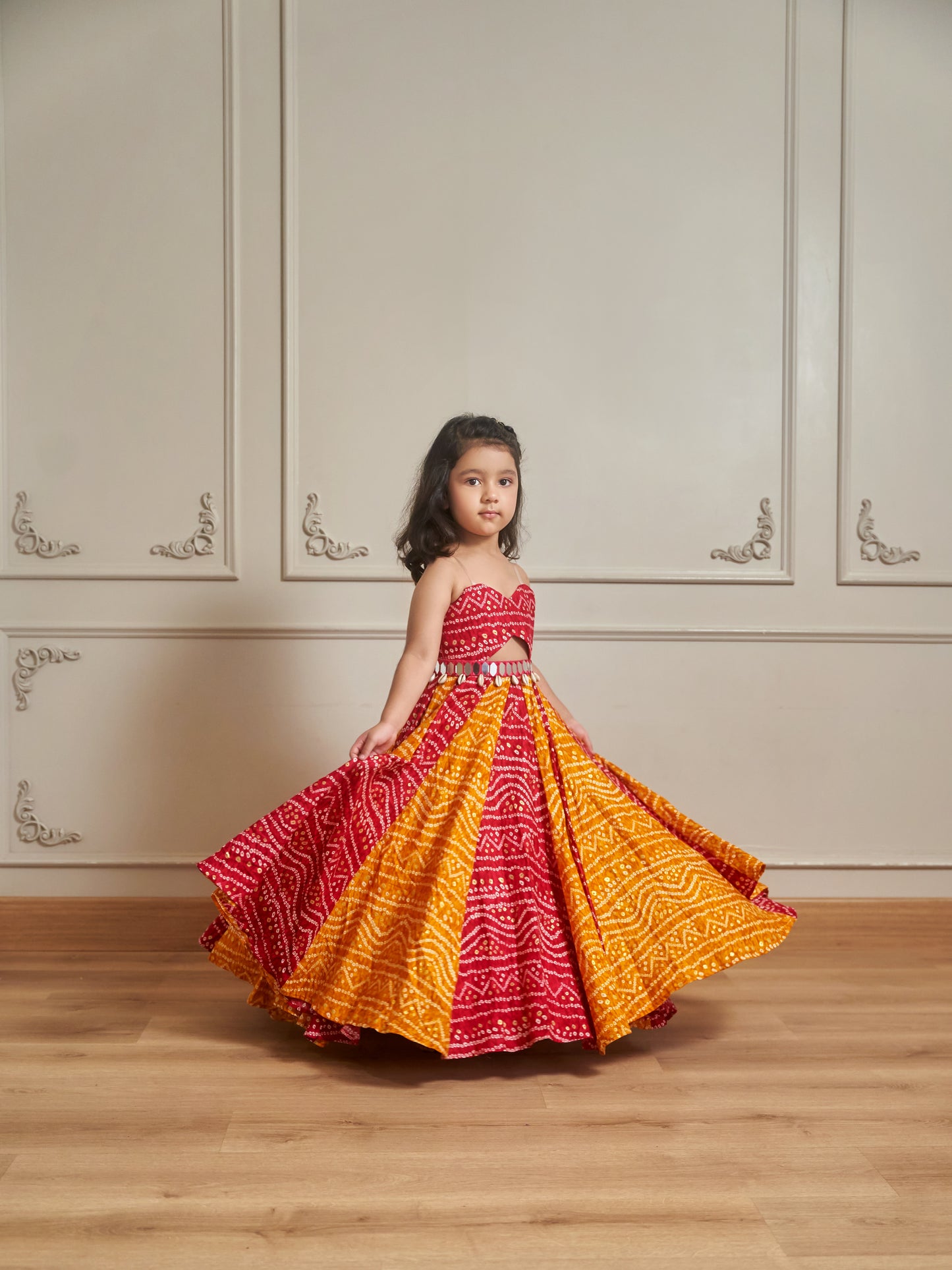 TWO TONNED BANDHANI INDO WESTERN PIECE WITH A CUTOUT AND A DETACHABLE BELT