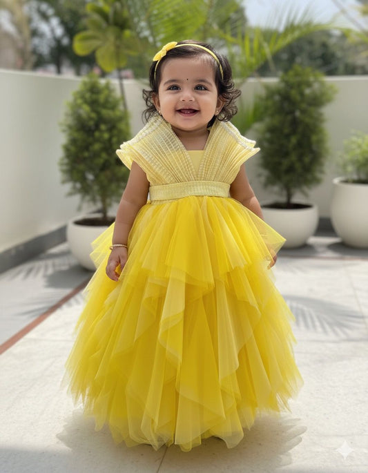 YELLOW ASSYMETRICAL RUFFLES WITH RING TOP